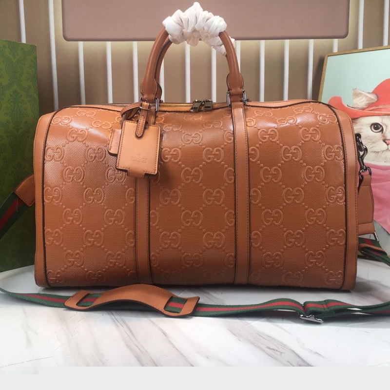 G*u*i travel bags